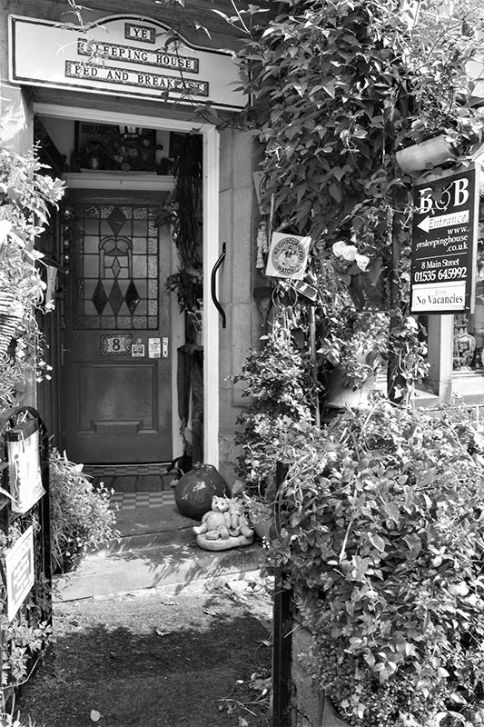 Black and white photo of Ye Sleeping House Bed and Breakfast in Haworth